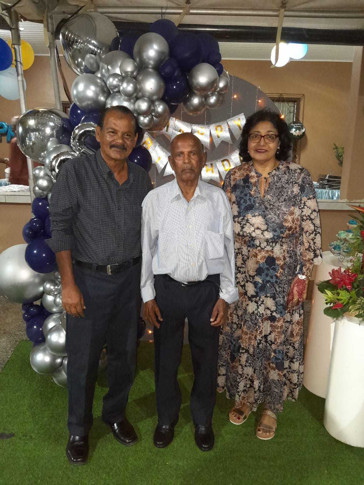 Mohamed Haroenkhan Abdul with family at a birthday celebration