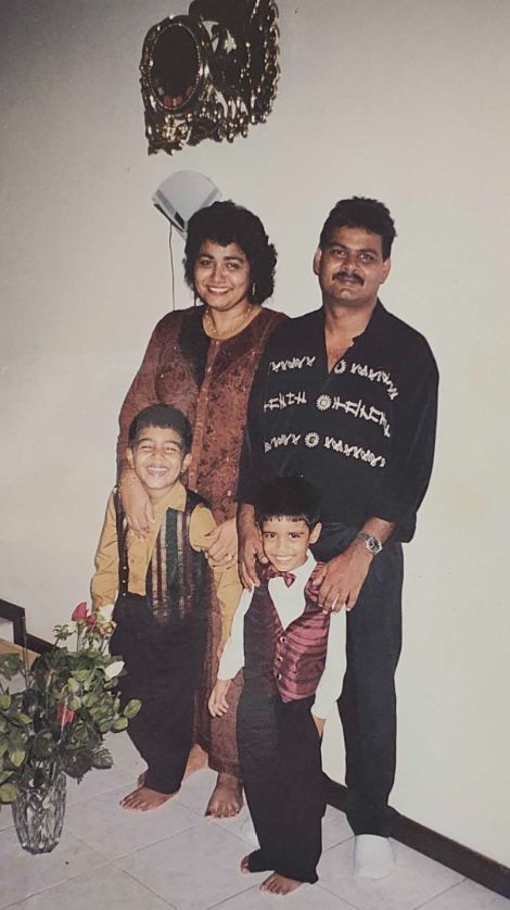 Mohamed Haroenkhan Abdul with his wife and their two young sons at home