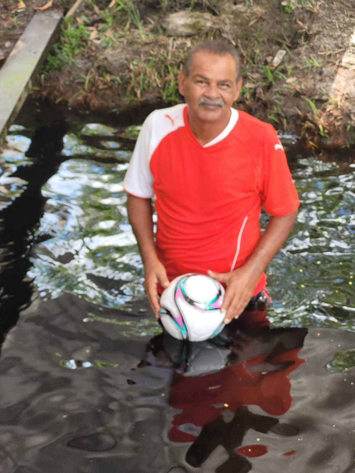 Mohamed Haroenkhan Abdul holding a football