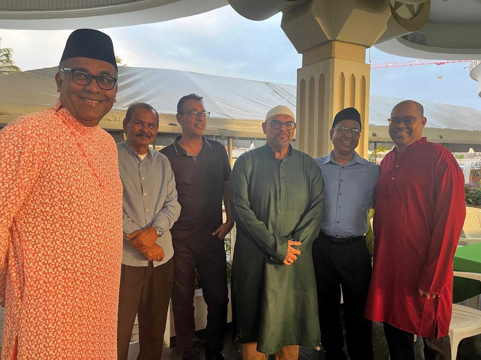 Mohamed Haroenkhan Abdul with friends after Eid prayers